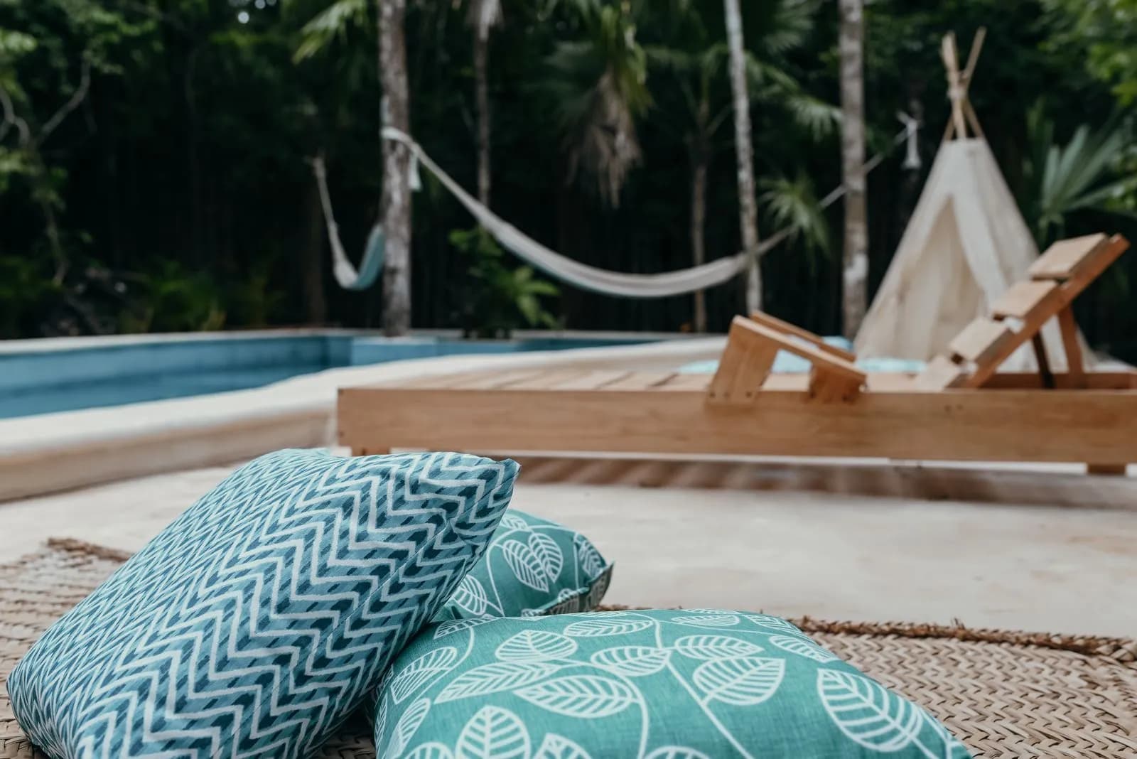 The cenote-fed pool with hammocks at Lunita